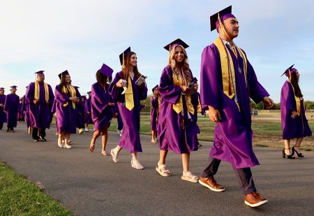 Perfect evening for 'Pomp and Circumstance' at Lemoore High School Graduation LHS grads march into Tiger Stadium Thursday night.